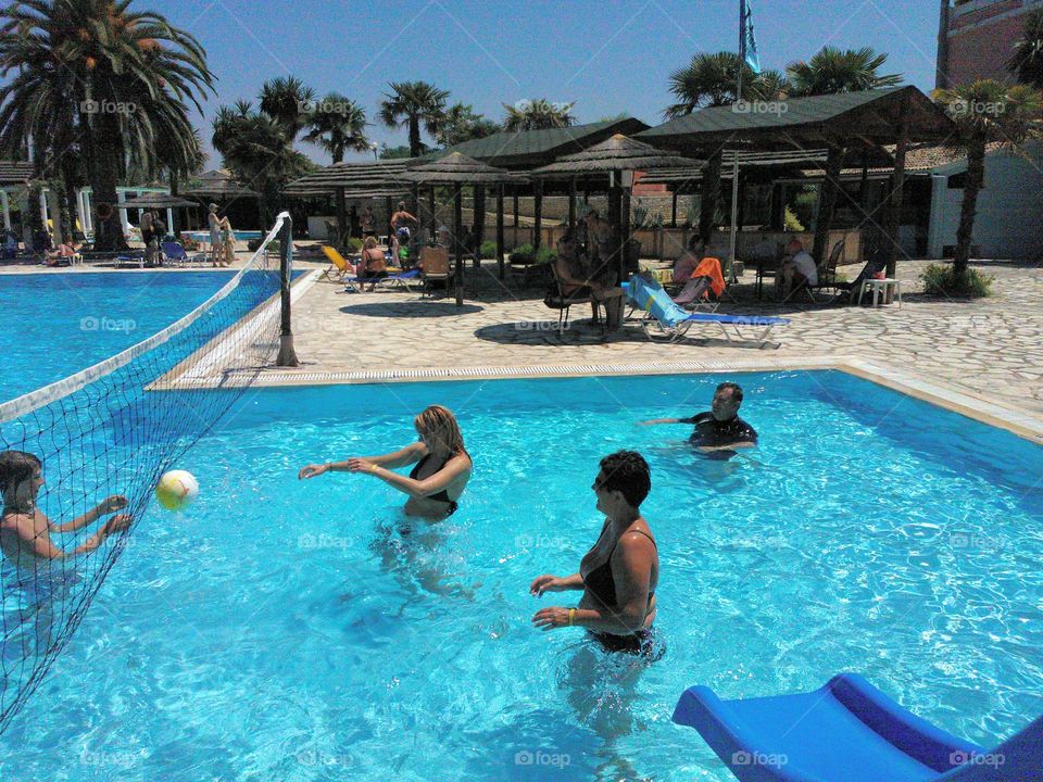 Tourist enjoying in swimming pool