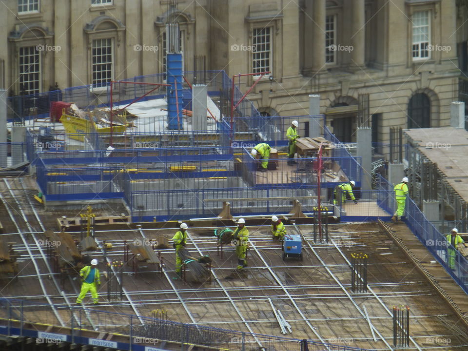 construction workers working on a building site 