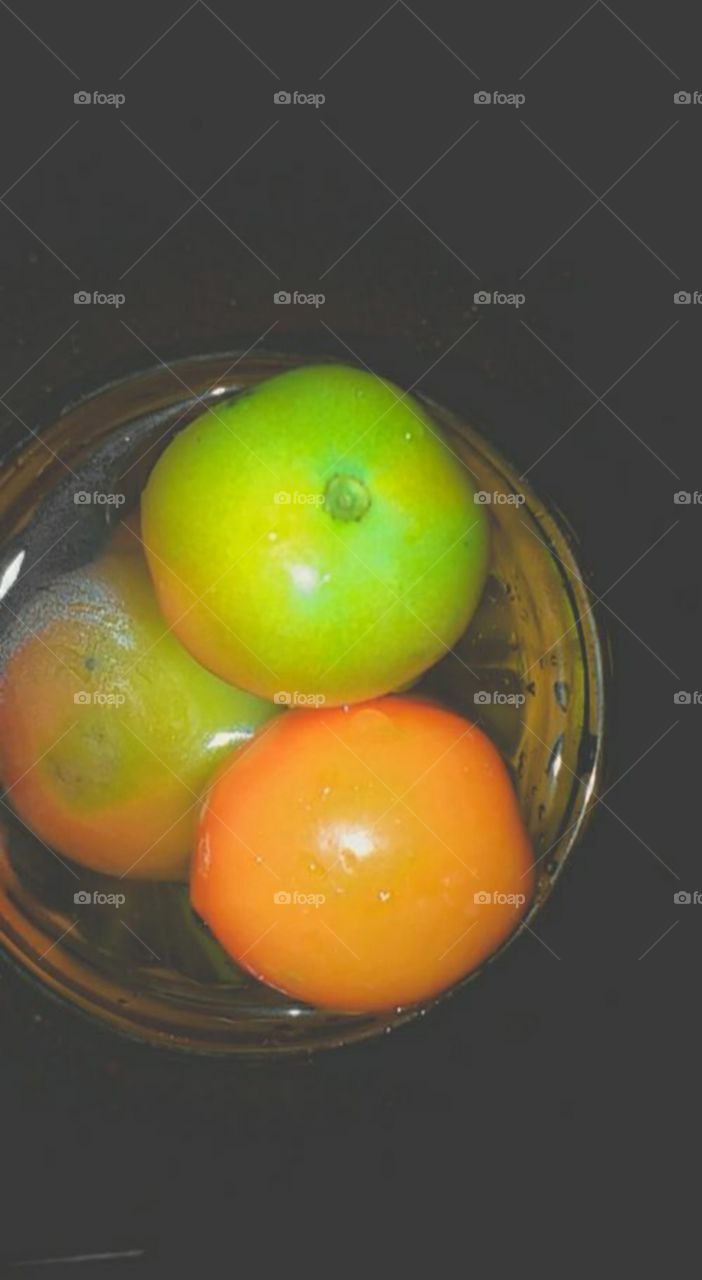 beautiful three green and red tomatoes