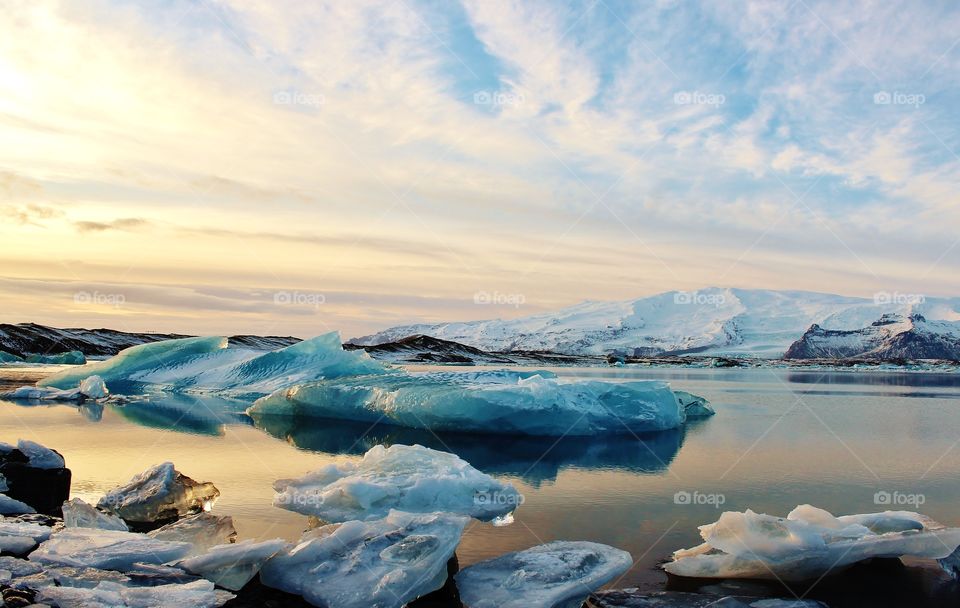 glacier lagoon in Iceland. giant blocks of ice crystal floating on lake mirror