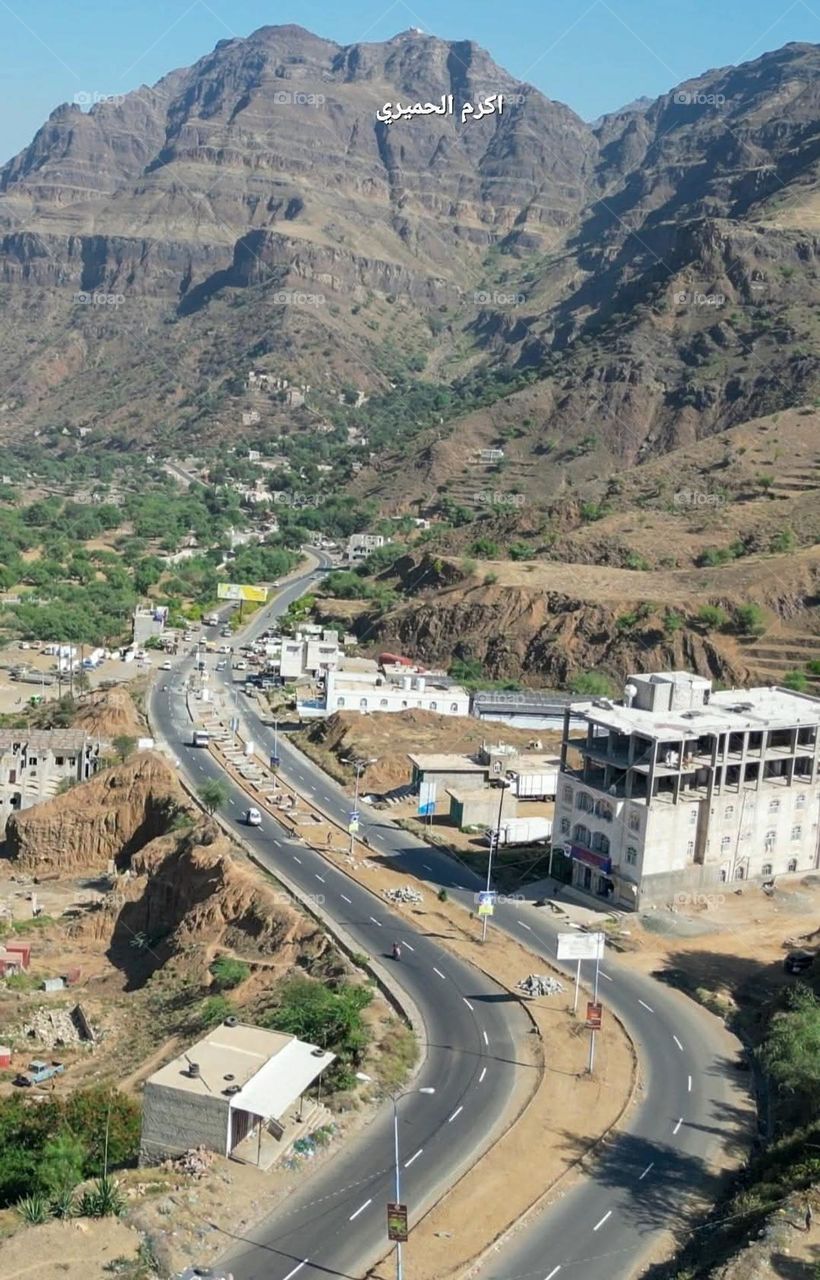 A stunning view of green mountains covered in fog in Yemen