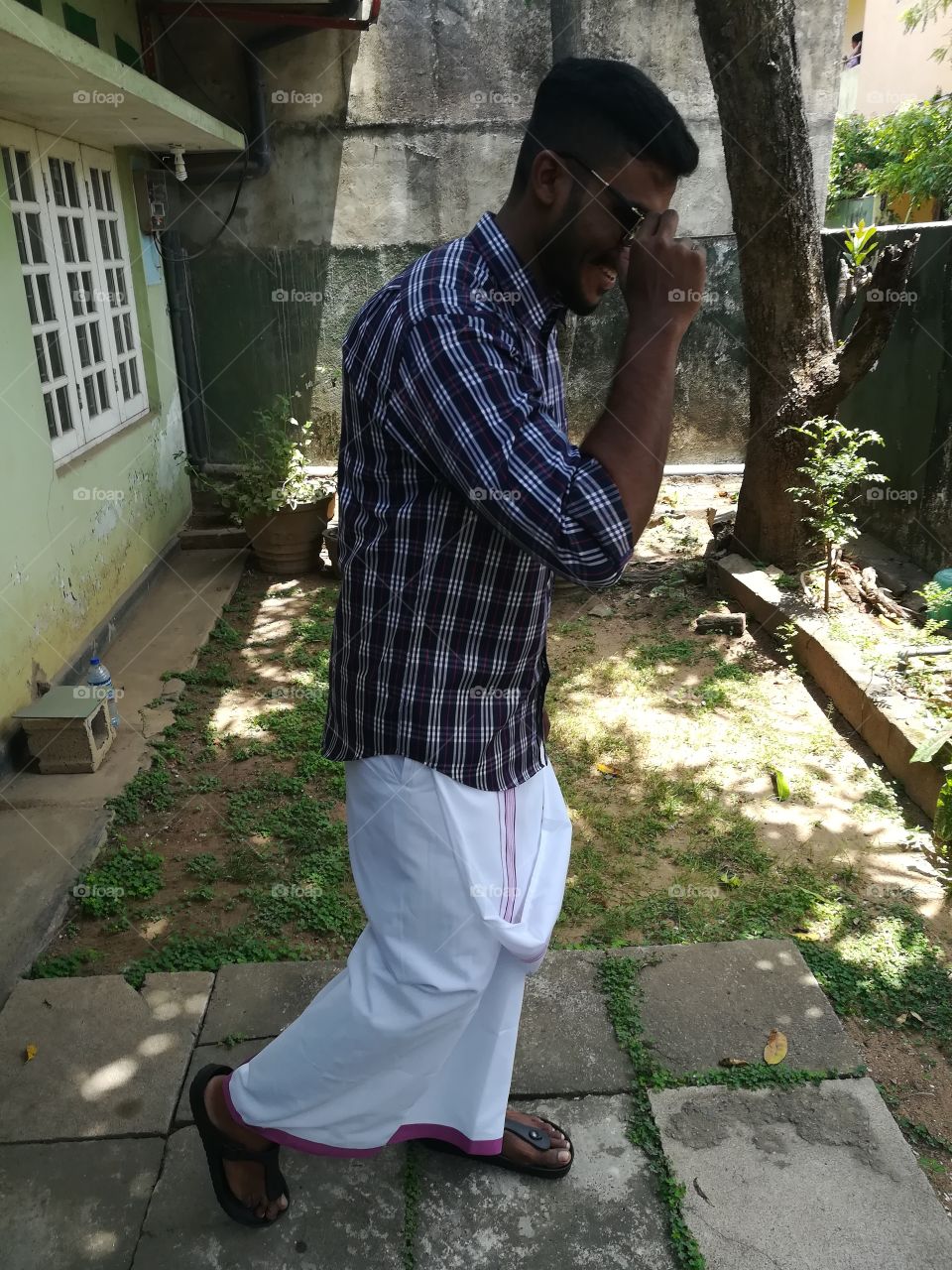 Stylish Tamilan with a sunglass