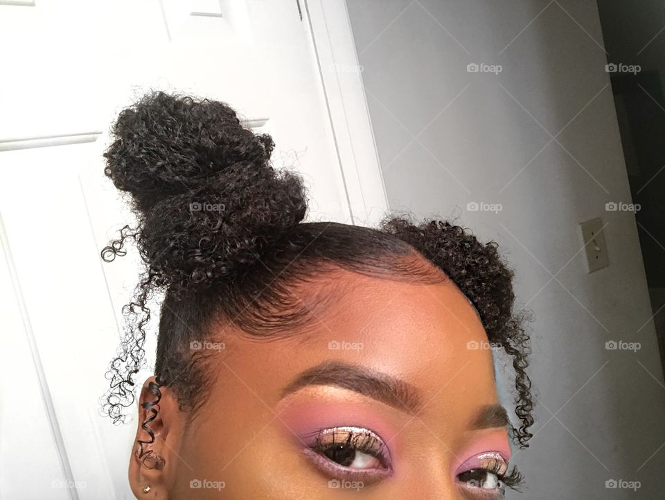 This makeup look was inspired by an pink & purple sky toned sunset on a view from the beach. The glitter represents the foam from the water that washed up on the shore. The gold represents the little burst of light shown from the sun.