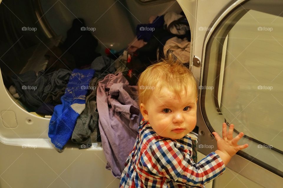 Toddler Girl Helping With Household Chores