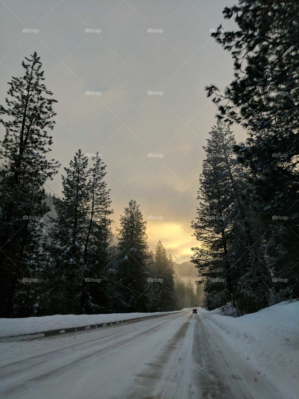 Idaho snowy road with sunset