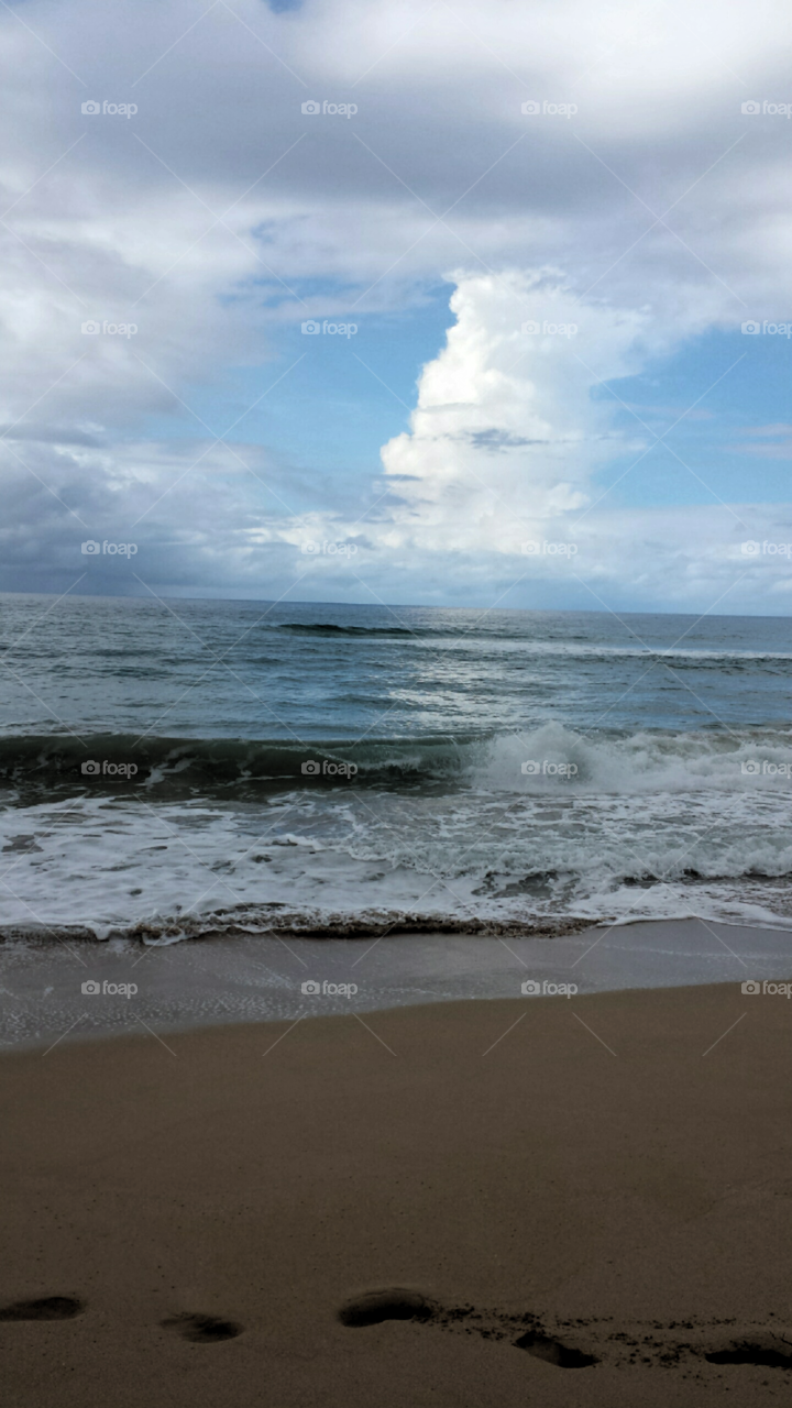 A Day in Kauai. A gloomy day in Kauai,  and thought the white clouds looked interesting mixed in with the gray.  So peaceful.