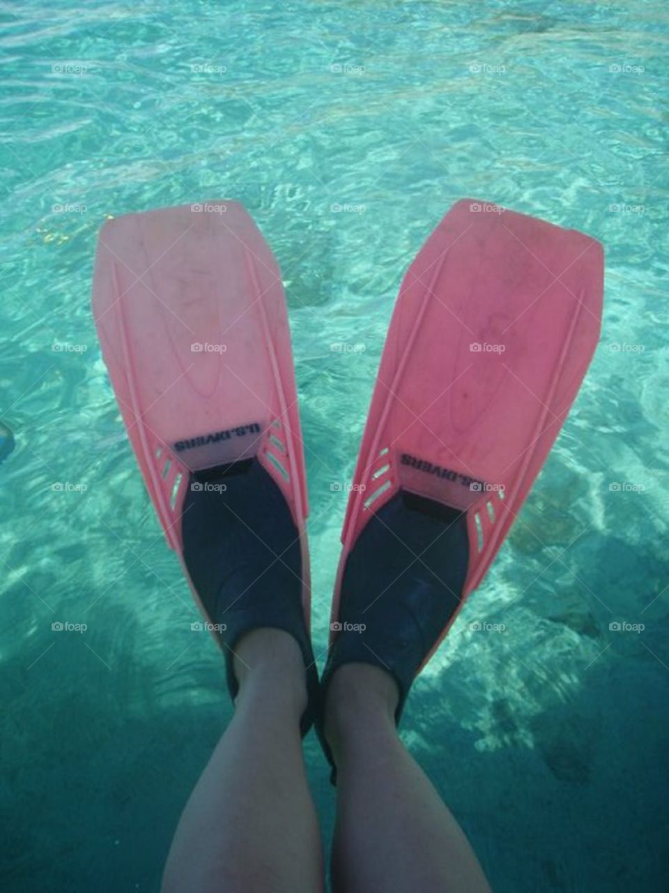 Snorkeling fins overlooking the water for the point of view competition