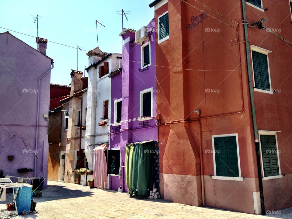 italy colourful houses in by dannytwotaps
