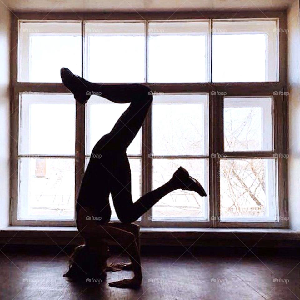 Dancer near window