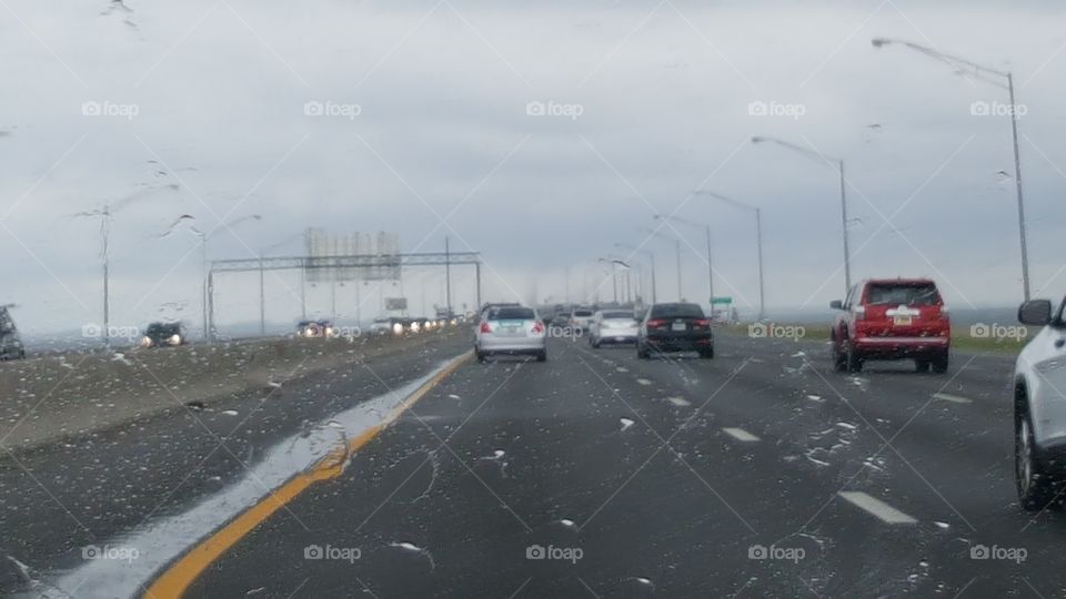 The storm rages in as people attempt to reach their destinations.