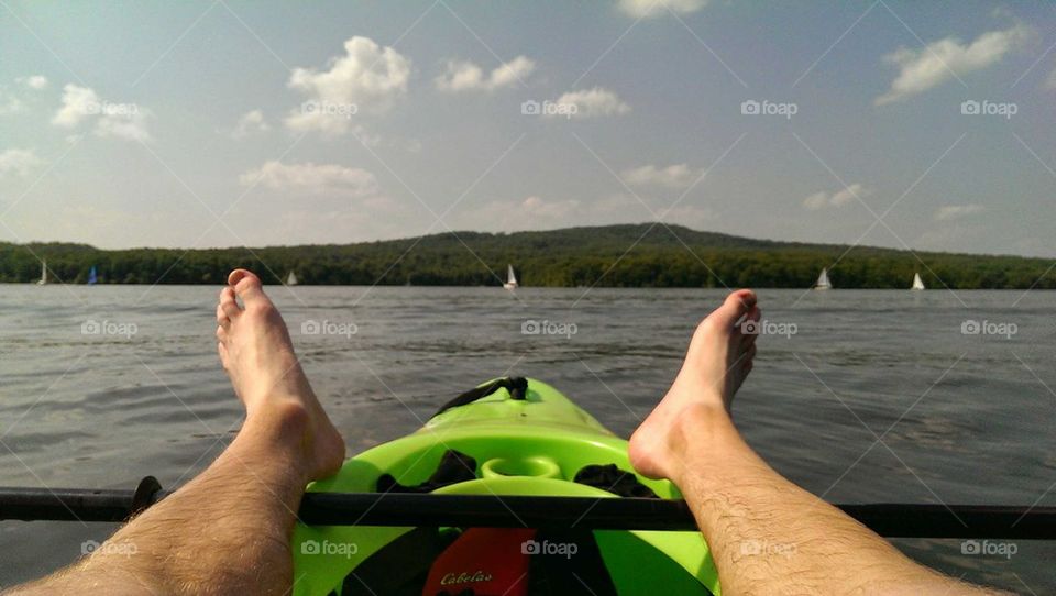 Feet up on the kayak 