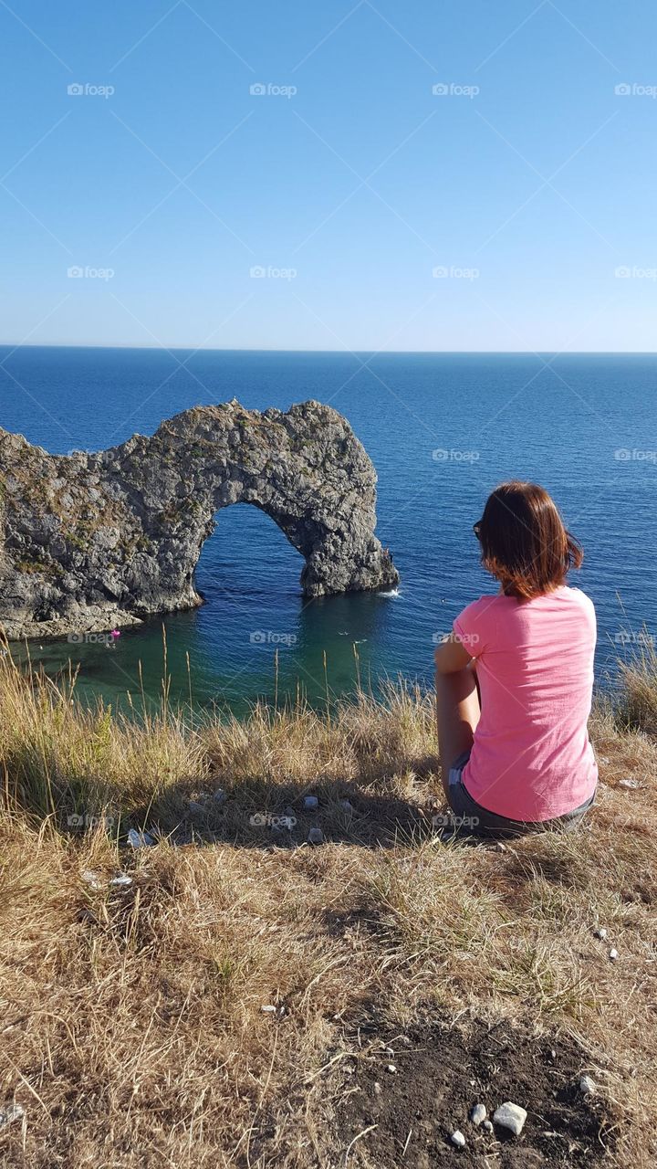 Travel time. Baby pink colour. Seashore. Nice place in UK.