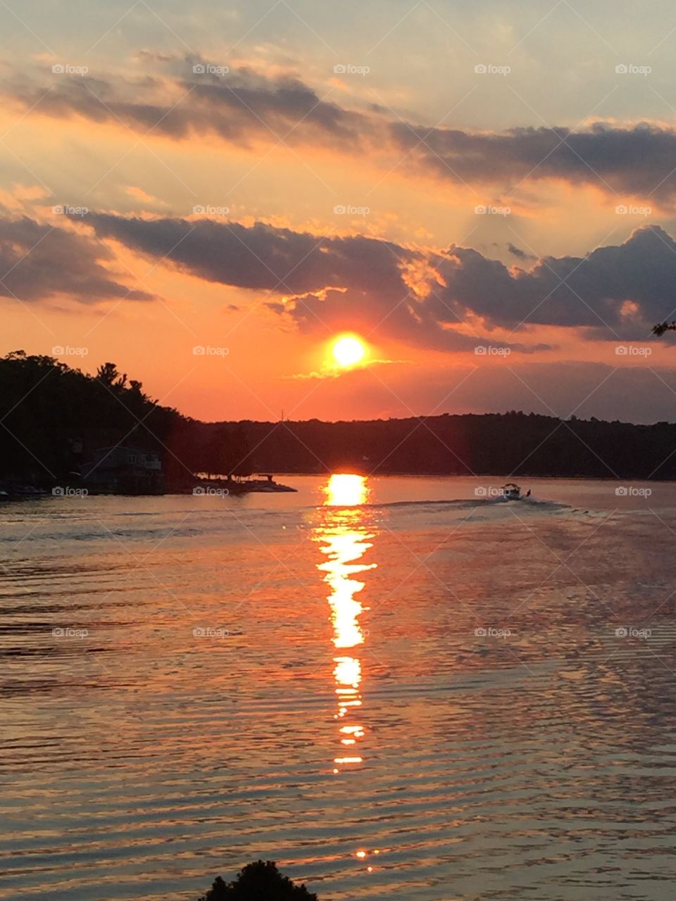 Sunset and wake boarding on Lake Harmony, Pennsylvania. 