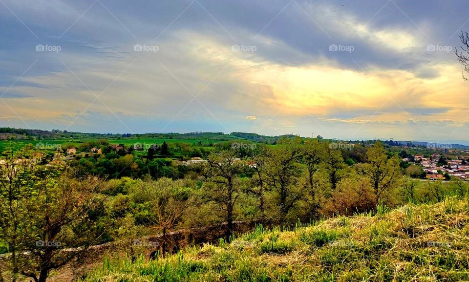 contrast of cloud and sun in the sky.