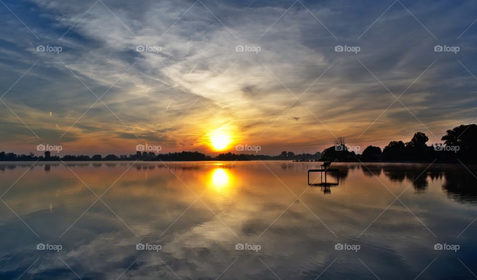 Dreamlike sunrise over the lake