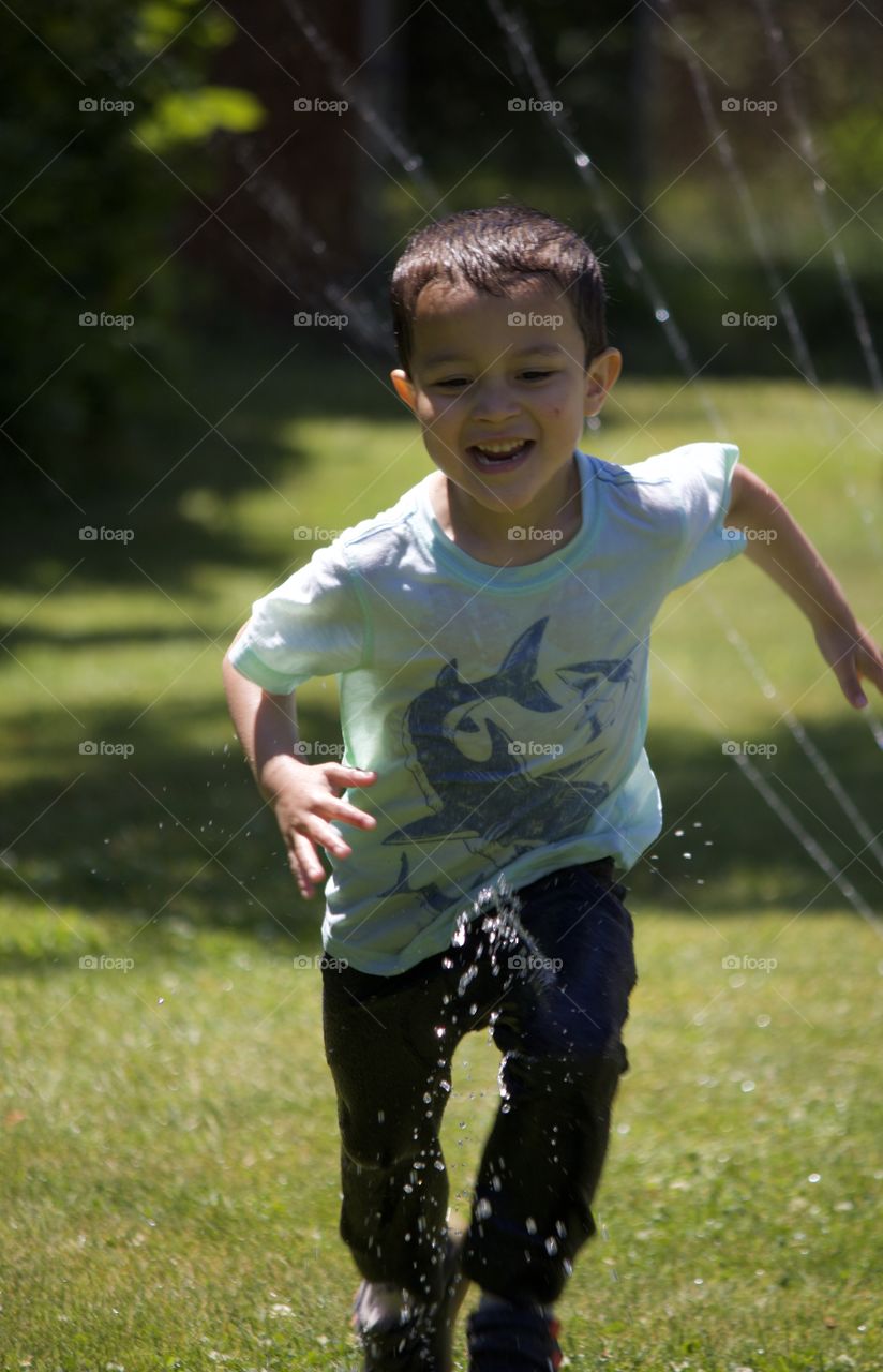 Running through the sprinkler 