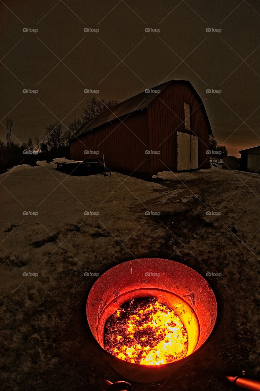 winter burn barrel on the farm