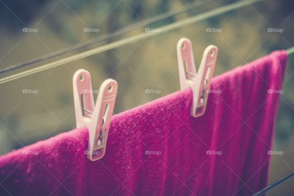 Clothes hanging on rope