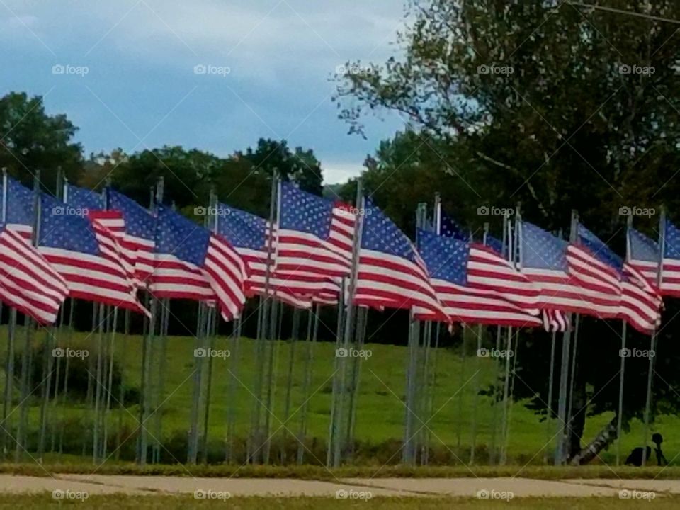 A cool breeze in the fall. The flags are waving beautifully.