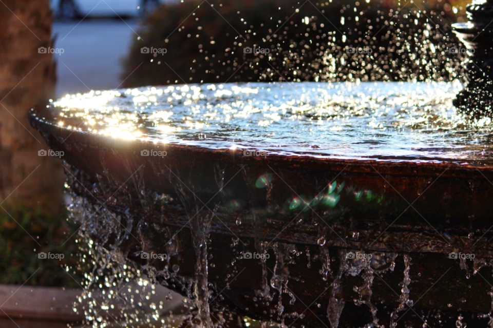 water fountain sculpture reflection by hayen