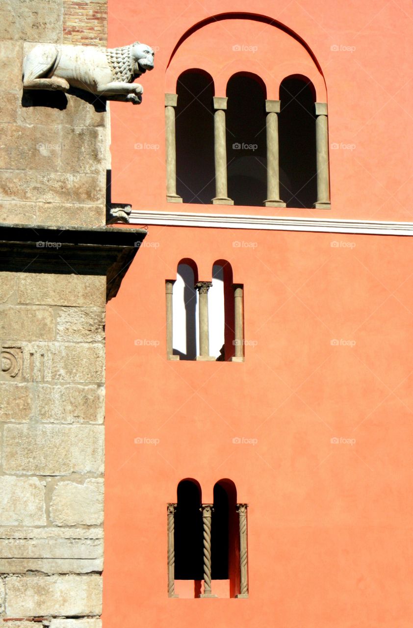 Leon sculpture on beltry facade