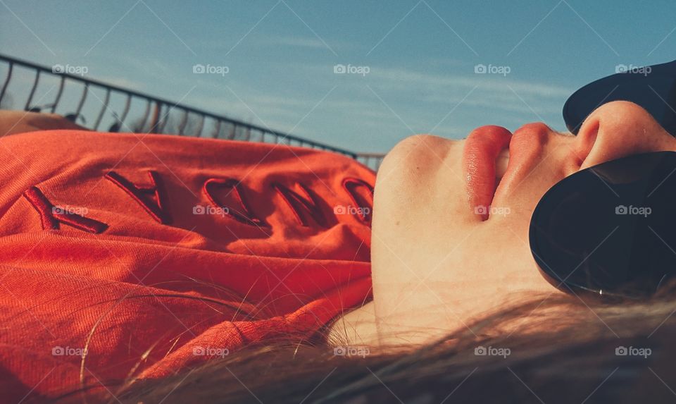 Sunbathing in the balcony on a nice clear sunny day.
