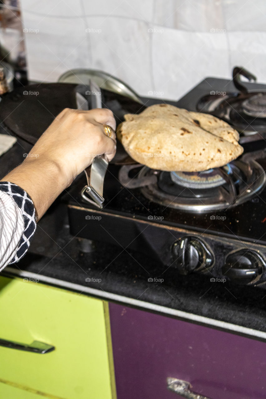 Chapati final stage the round puffy shape is the final chapati