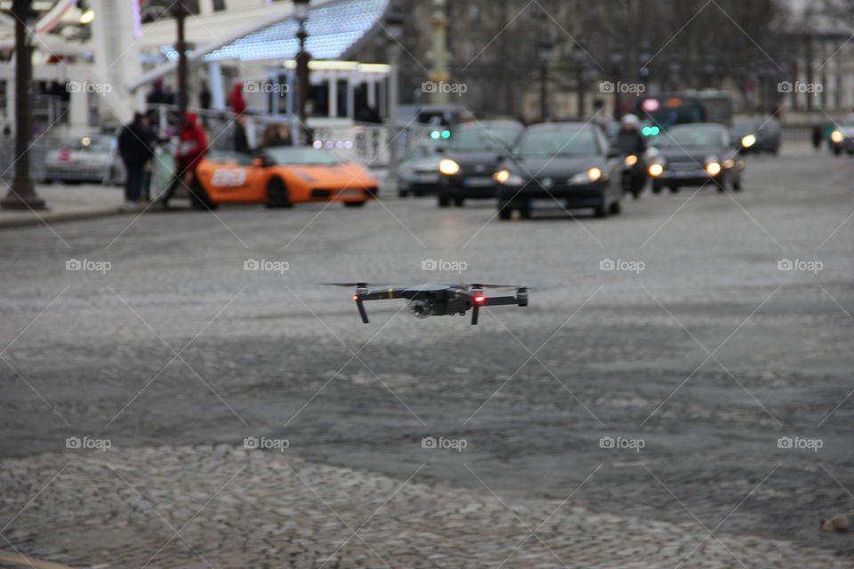 Drone flying under road