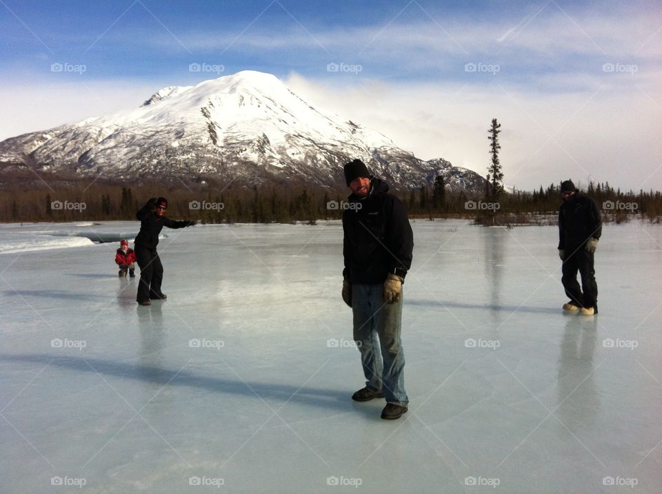Natural Ice Rink ALASKA. Exploring Alaska by monster truck & found this river run over creating a giant natural rink. 
