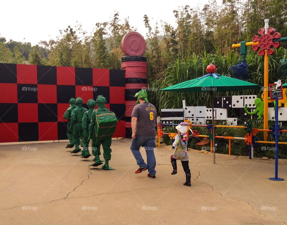 Marching with green army toys