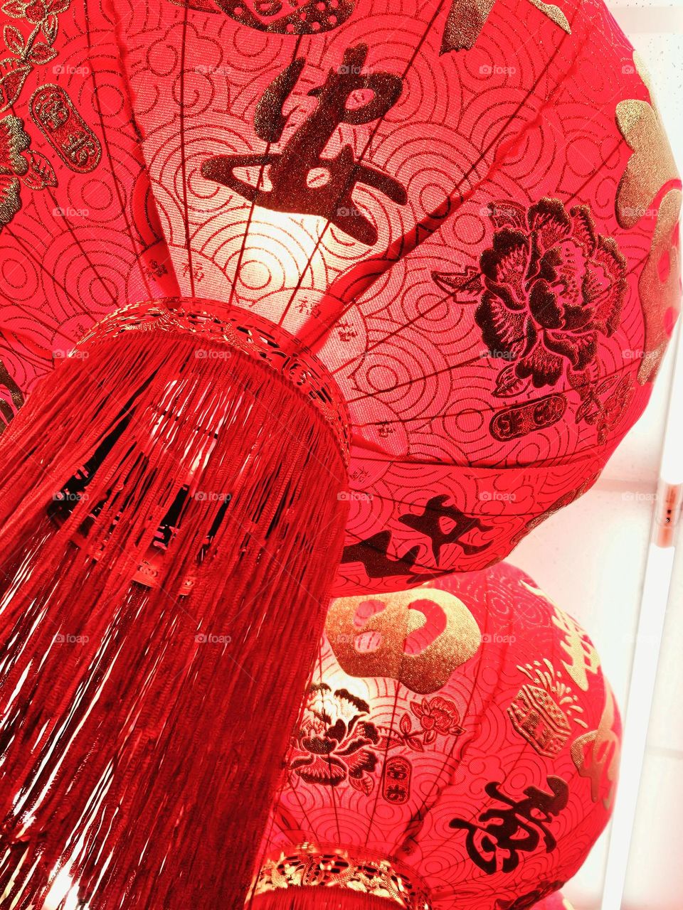 Hanging red lanterns high brings blessing and peace