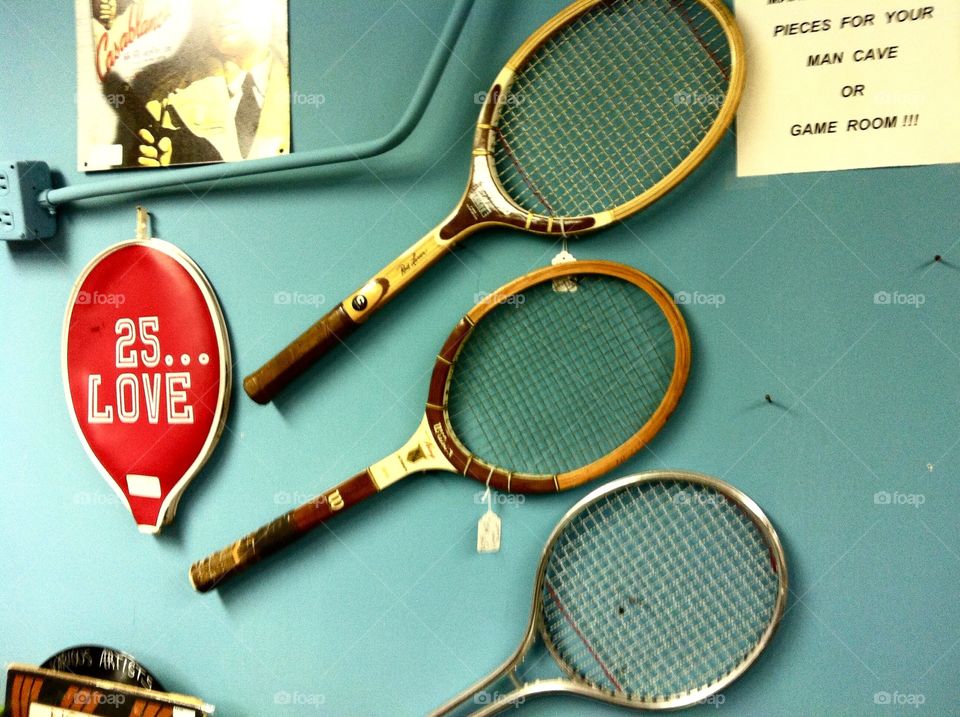 Vintage tennis rackets at flea market 