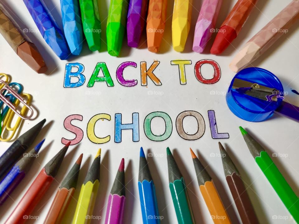 Ready to back to school! Lots of colored pencils, lots of crayons, paper clips, sharpener and lots of color.