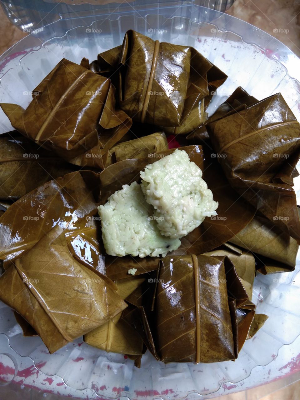traditional sticky rice tape wrapped in guava leaves