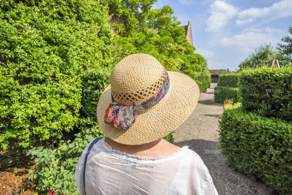 Woman. Straw hat