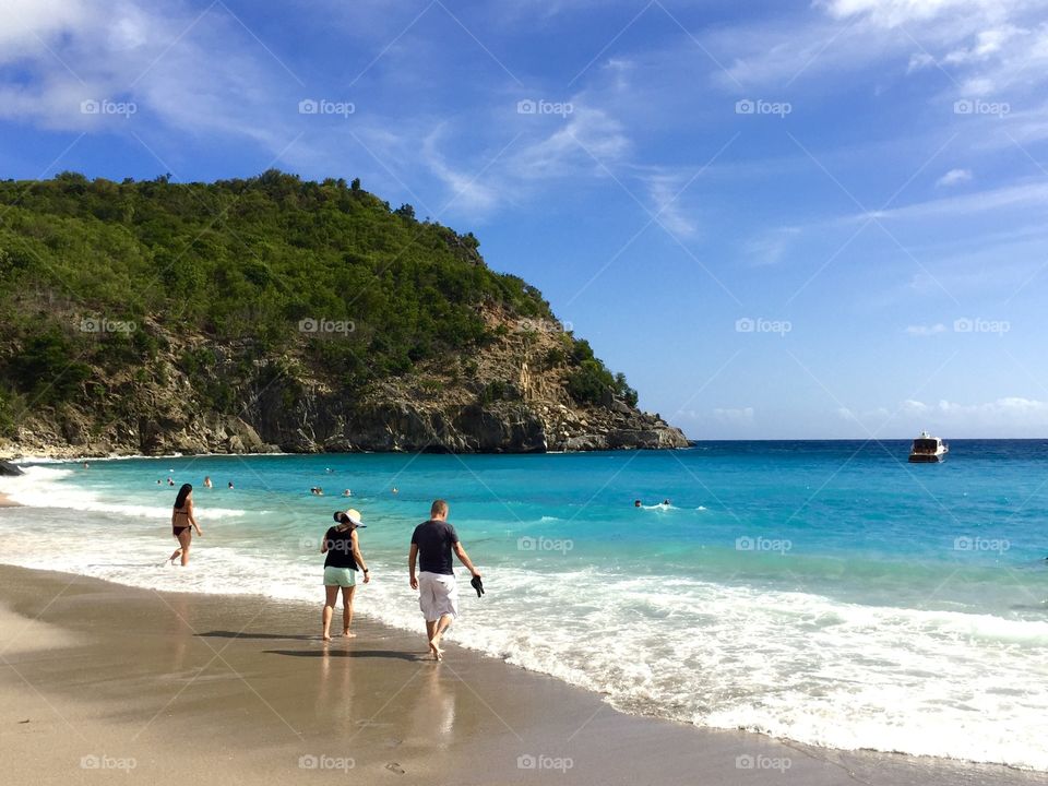 Drawn to the water across the shells which make up Shell Beach, Gustavia, Saint Barthélemy, French West Indies.