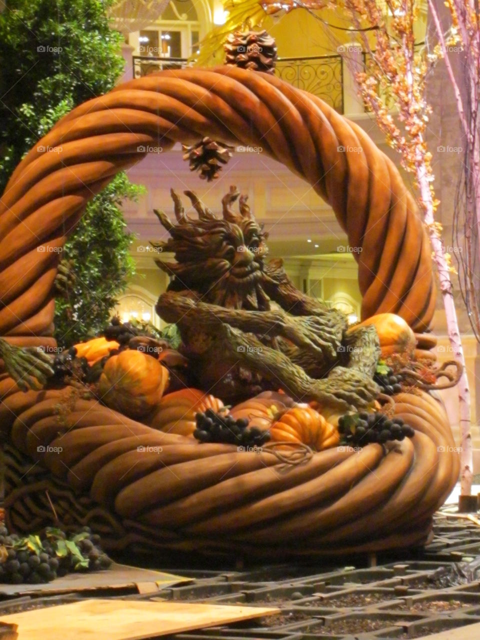 Unique Fall Art.  Autumn Tree and Pumpkins, Green Man Sculpture in Las Vegas Casino Display.