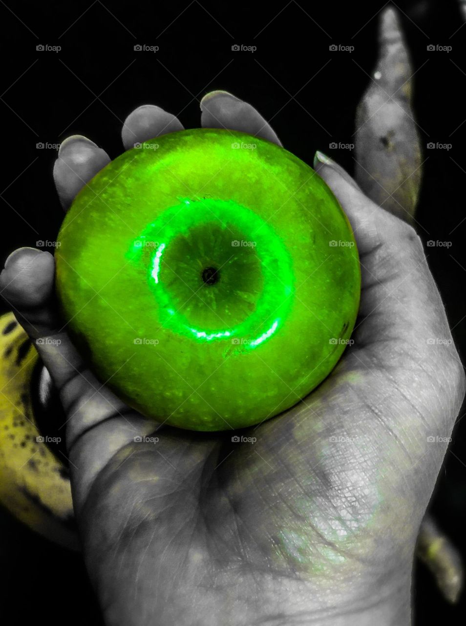 Holding a bright green apple 