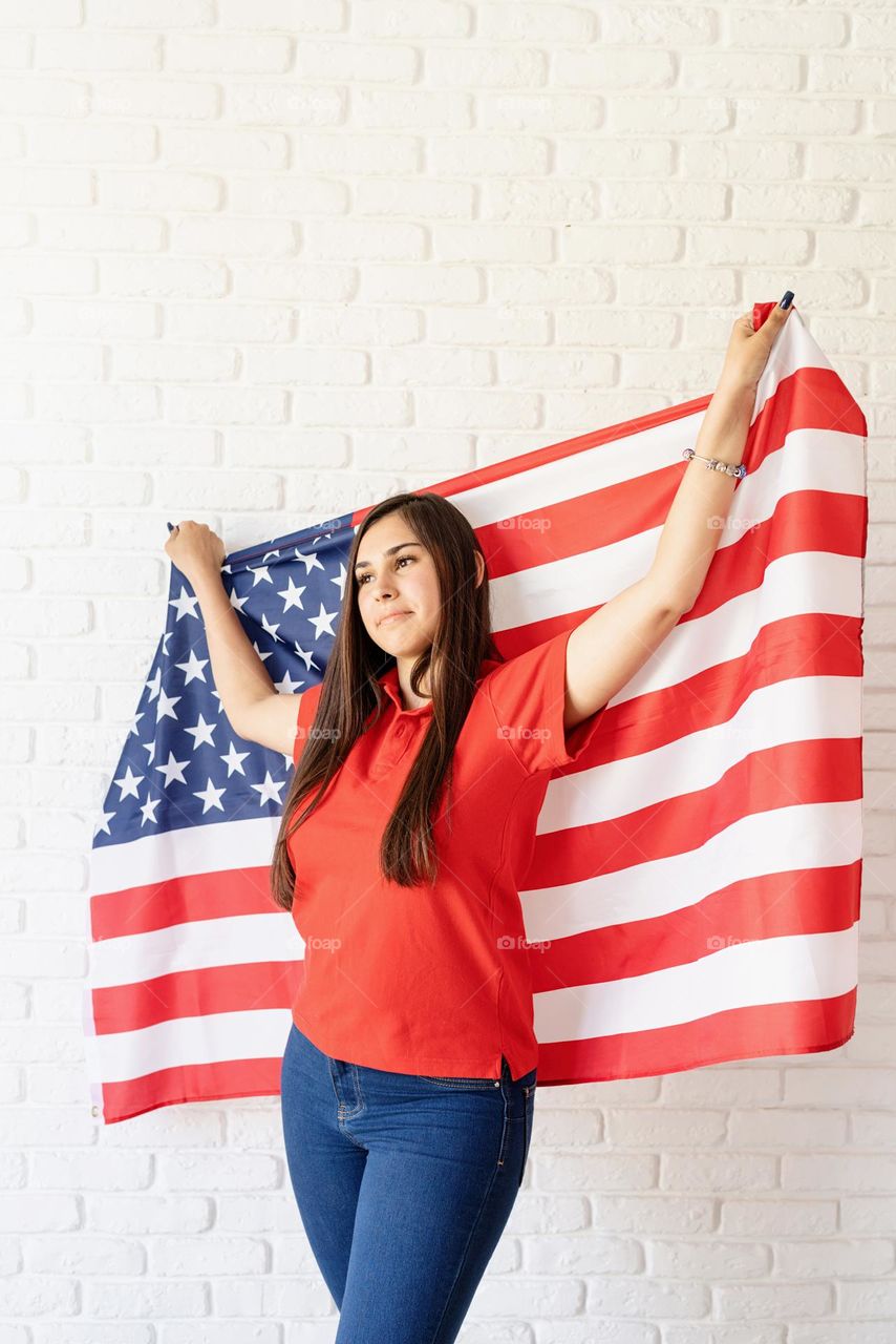 woman holding USA flag