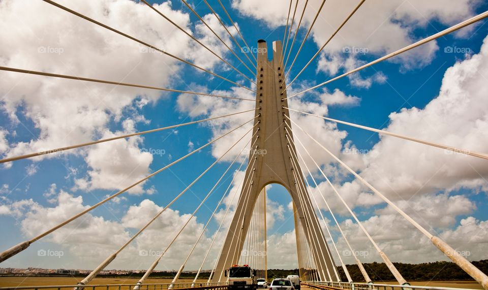 Bridge cables symmetrical against the sky in Portugal 
