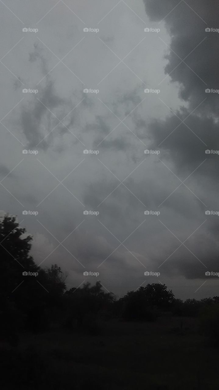 storm brewing. i was traveling home watching the clouds.