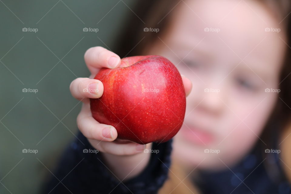 Offering an apple 