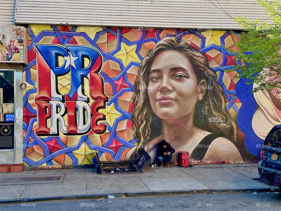 The mural on “Jefferson St” off “Broadway” in “Bushwick”, Brooklyn starts from left to right and extends over almost an entire city block depicting the “PRIDE” in Latin culture around the World. 2024. Hypnotic Productions