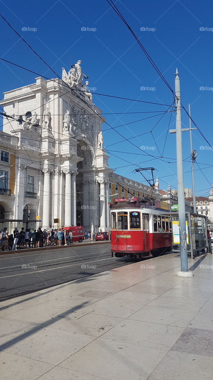 Greetings from Lisbon, Portugal with the famous landmark of the city, its tramway.