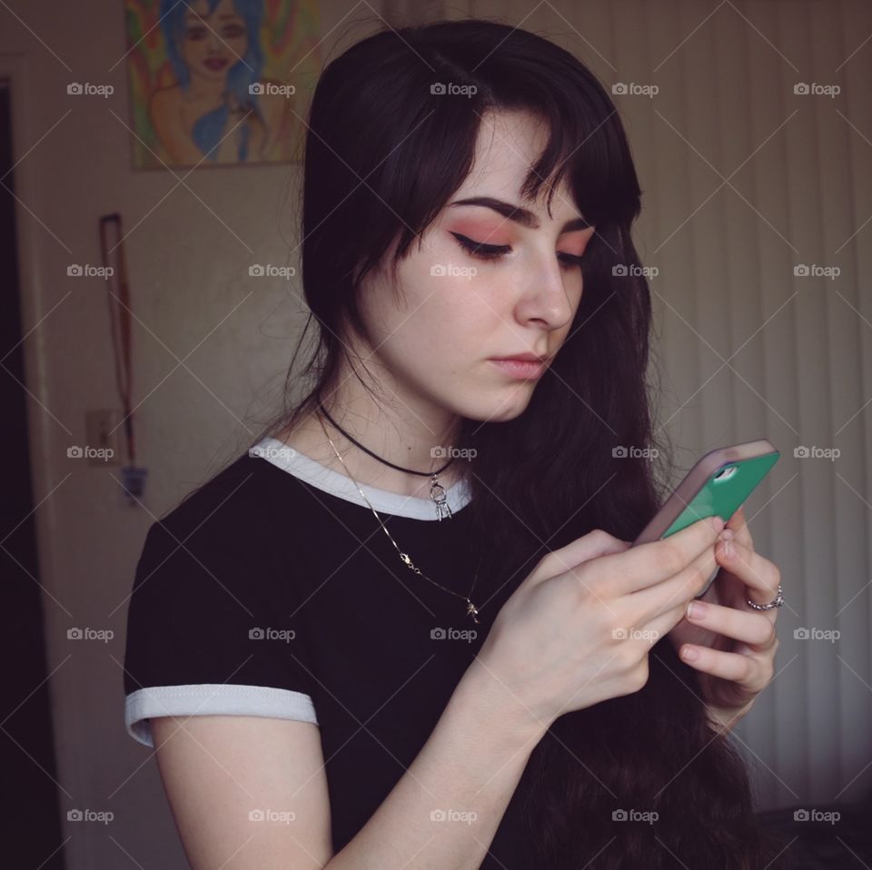 A girl checking her phone