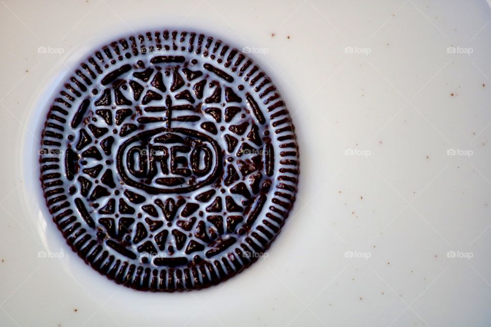 Oreo swimming in milk