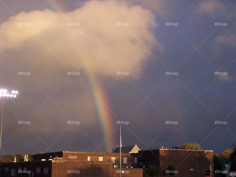 Rainbow going thru a heart shaped cloud