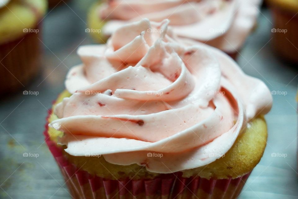 Extreme close-up of strawberry cupcake
