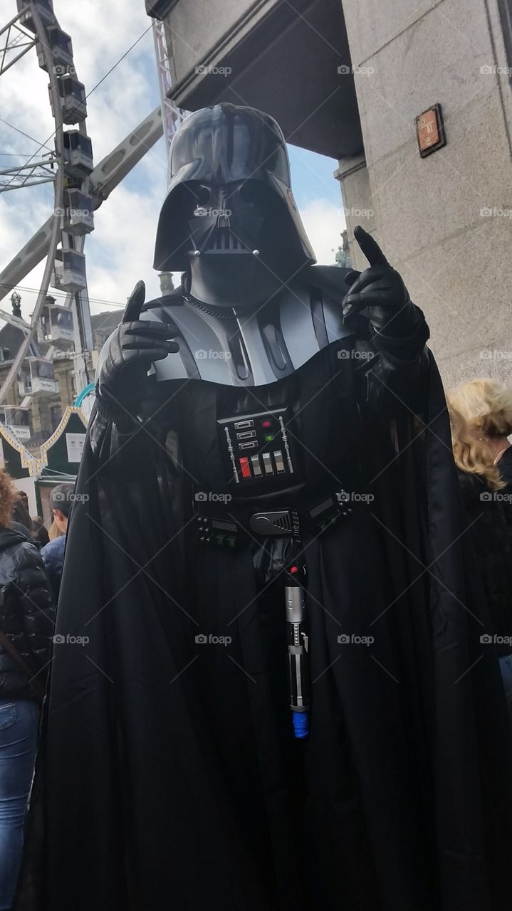 darth vader posing on the dam in amsterdam