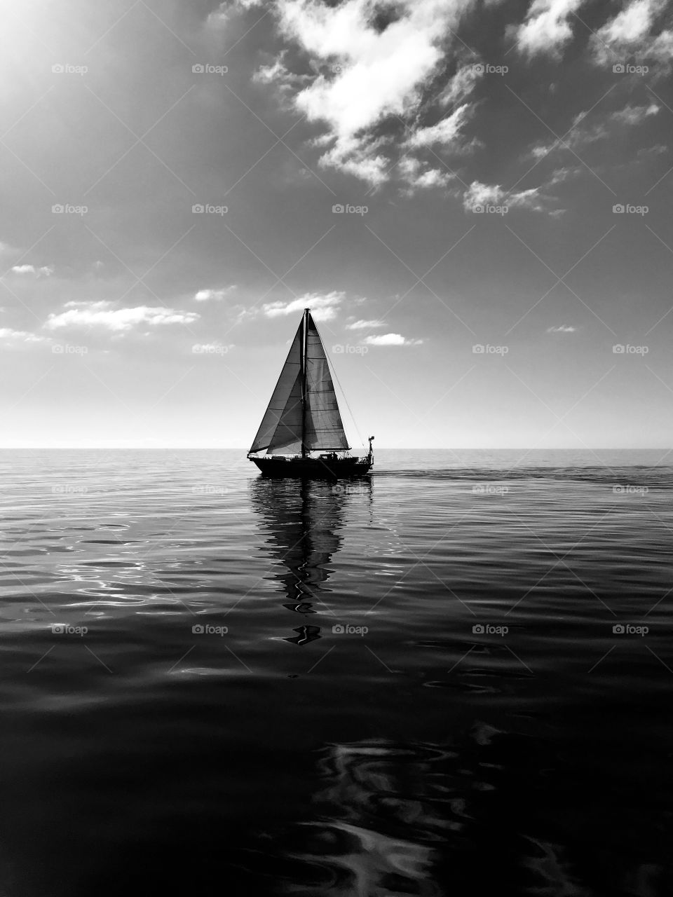 silhouette of a sailboat in the Atlantic Ocean